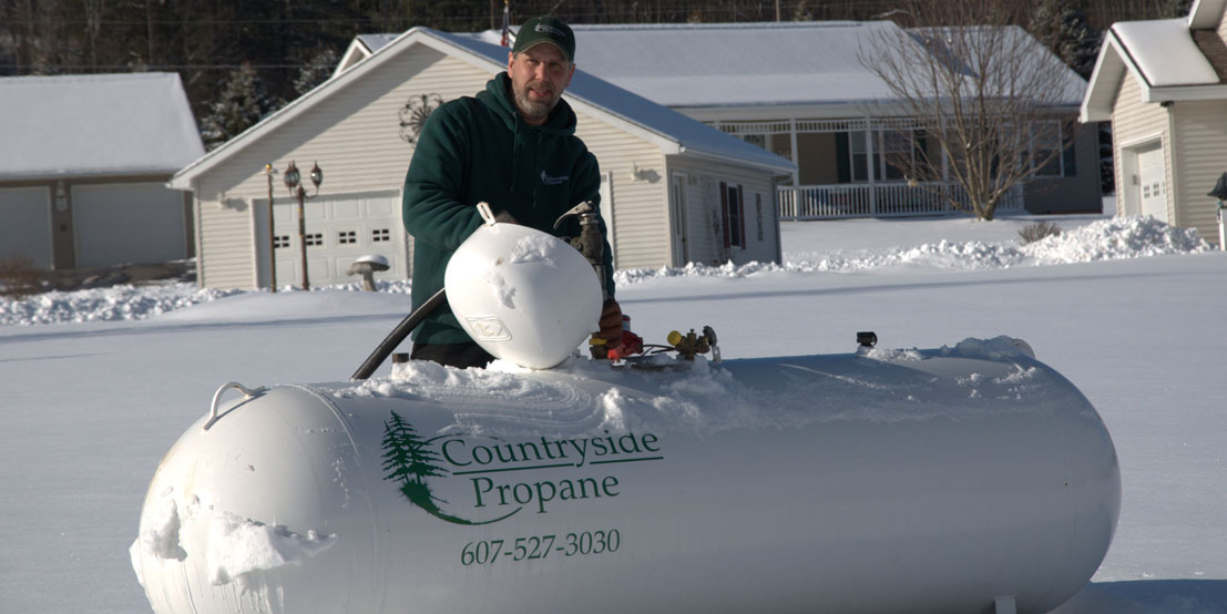 Countryside Propane Technician Delivering Propane to NY Home or Business